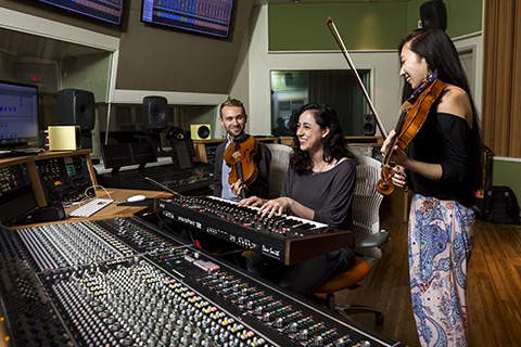 Students practicing in the Weeks Recording Studio